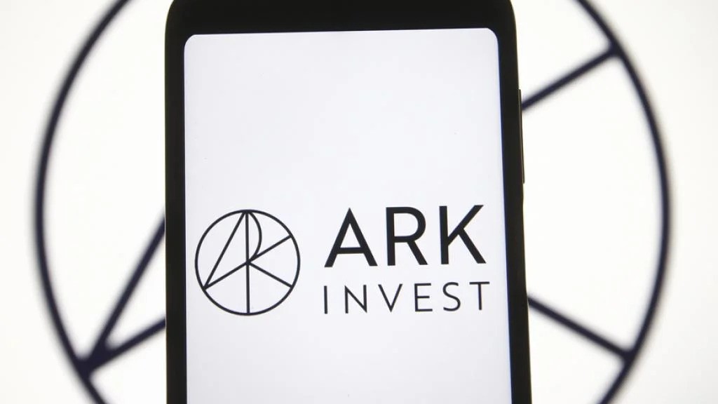 What signals do ARK Invest's increased holdings in Coinbase and reduced holdings in Block send, and why are they clearly bullish on Bitcoin?